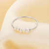 Rosalie – Pendientes de gota dorados con perla.