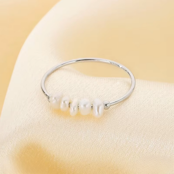 Rosalie – Pendientes de gota dorados con perla.