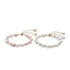 Carina – Pendientes de oro con perlas móviles.