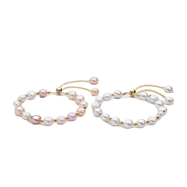 Carina – Pendientes de oro con perlas móviles.