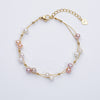 Marlena – Pulsera dorada con acentos de perlas.
