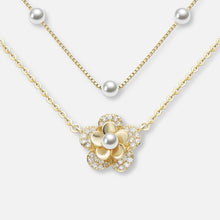 Pavla-Marie – Pendientes de oro con borde de perla.