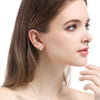 Helena – Pendientes dorados con perla ovalada.