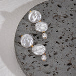 Romina – Pulsera dorada con perlas y eslabones delicados.