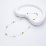 Jana – Pendientes de perlas minimalistas con cierre de presión.