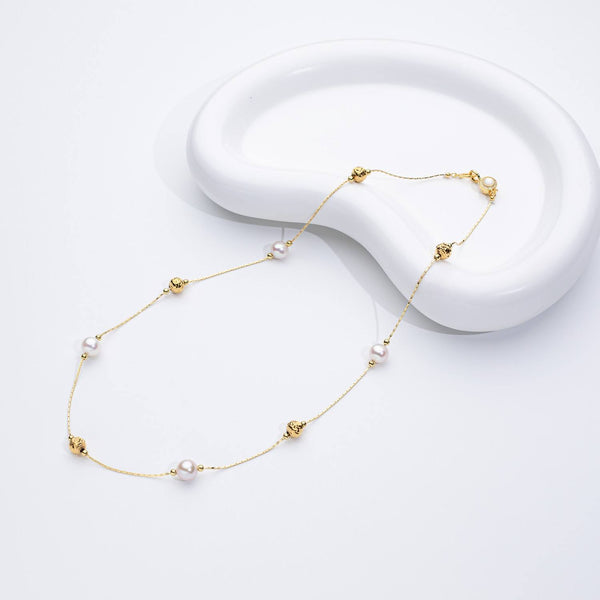 Jana – Pendientes de perlas minimalistas con cierre de presión.