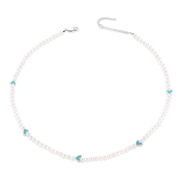 Beáta – Pendientes de perlas redondas con marco dorado liso.