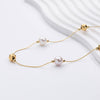 Jana – Pendientes de perlas minimalistas con cierre de presión.