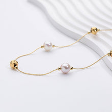 Jana – Pendientes de perlas minimalistas con cierre de presión.