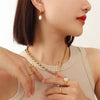 Greta-Marie – Pendientes de oro con perlas colgantes.