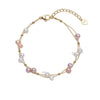 Marlena – Pulsera dorada con acentos de perlas.