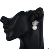 Selina – Pulsera de perlas con colgante dorado.