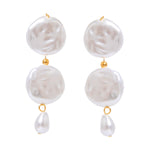 Romina – Pulsera dorada con perlas y eslabones delicados.