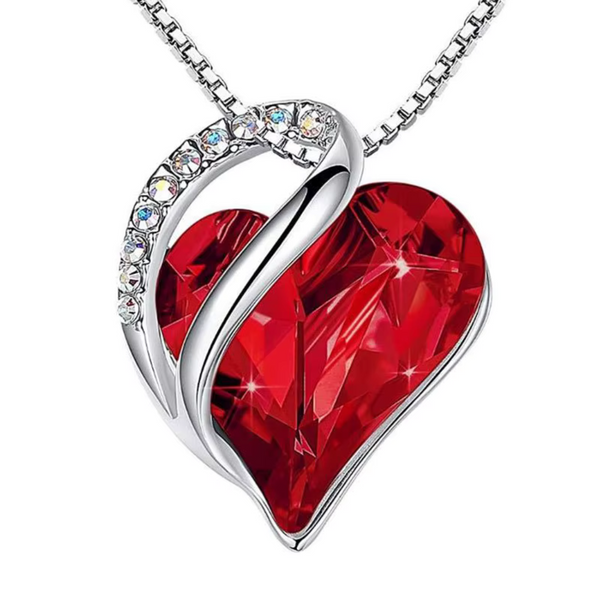 Hana-Marie – Heart-shaped pendant with ruby and silver glitter.
