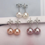 Frieda – Pendientes de oro con perlas y forma clara.