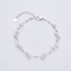 Marlena – Pulsera dorada con acentos de perlas.