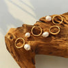 Greta-Marie – Pendientes de oro con perlas colgantes.