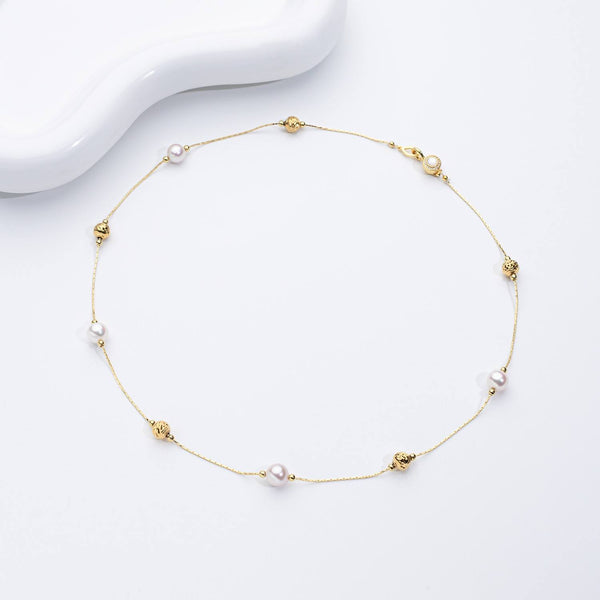 Jana – Pendientes de perlas minimalistas con cierre de presión.