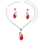 Ingrid – Conjunto con rubí y brillo dorado.