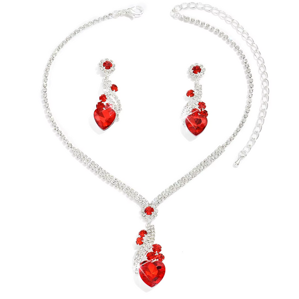 Ingrid – Conjunto con rubí y brillo dorado.