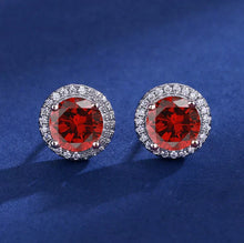 Luisa – Pendientes de rubí con diseño solar.