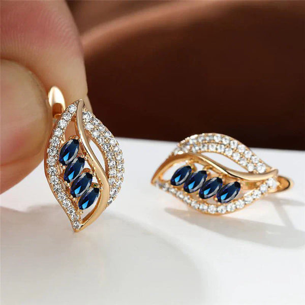 Nora – Pendientes de oro con zafiro y circonio.