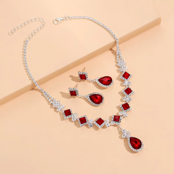 Mariana – Conjunto de rubí con acento dorado.