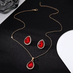 Tamara – Conjunto con rubíes y suave degradado de color.