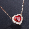 Romy – Collar de plata con corazón de rubí.