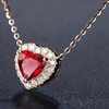 Romy – Collar de plata con corazón de rubí.