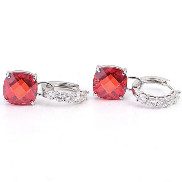 Klára-Marie – aretes circulares con decoración de rubí.