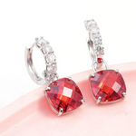 Klára-Marie – aretes circulares con decoración de rubí.