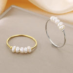 Rosalie – Pendientes de gota dorados con perla.