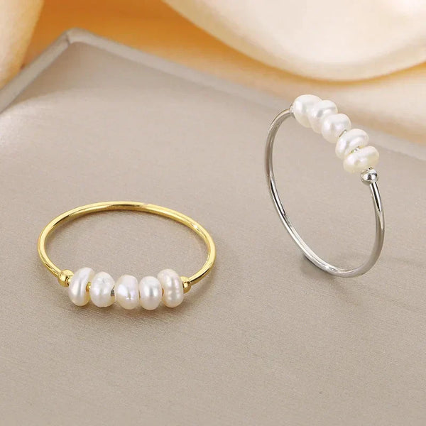 Rosalie – Pendientes de gota dorados con perla.