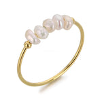 Rosalie – Pendientes de gota dorados con perla.