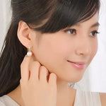 Olivia-Rosa – Pendientes de oro con perlas.