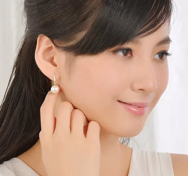 Olivia-Rosa – Pendientes de oro con perlas.
