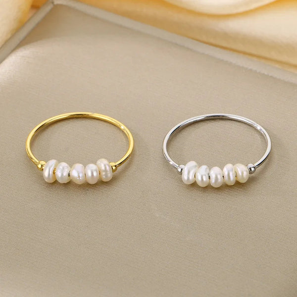Rosalie – Pendientes de gota dorados con perla.