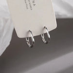 Pendientes de plata esterlina con inserto redondo