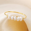 Rosalie – Pendientes de gota dorados con perla.