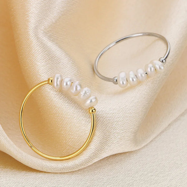 Rosalie – Pendientes de gota dorados con perla.