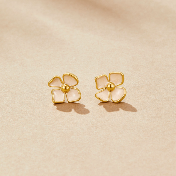 Greta – Pendientes redondos con diseño floral.