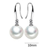 Olivia-Rosa – Pendientes de oro con perlas.