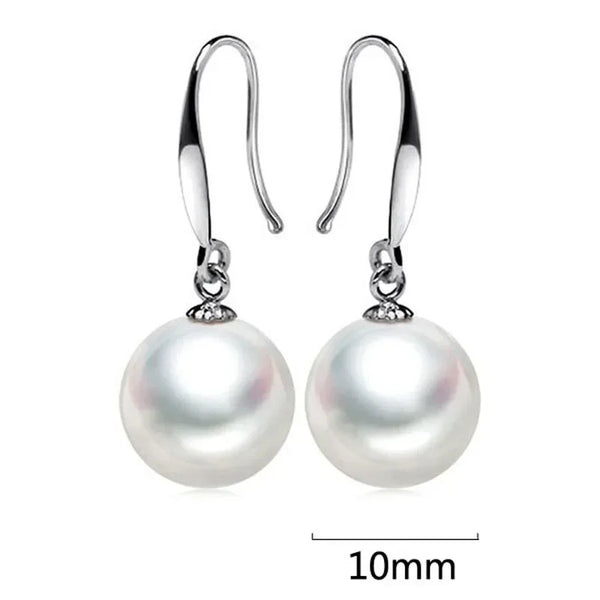 Olivia-Rosa – Pendientes de oro con perlas.