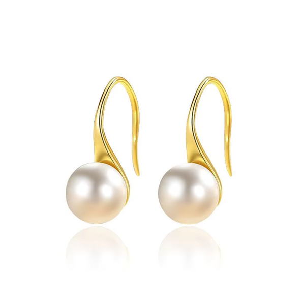 Helena – Pendientes dorados con perla ovalada.