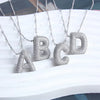Necklace with letter pendants