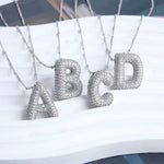 Necklace with letter pendants
