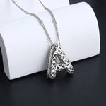 Necklace with letter pendants