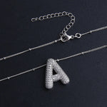 Necklace with letter pendants
