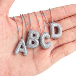 Necklace with letter pendants
